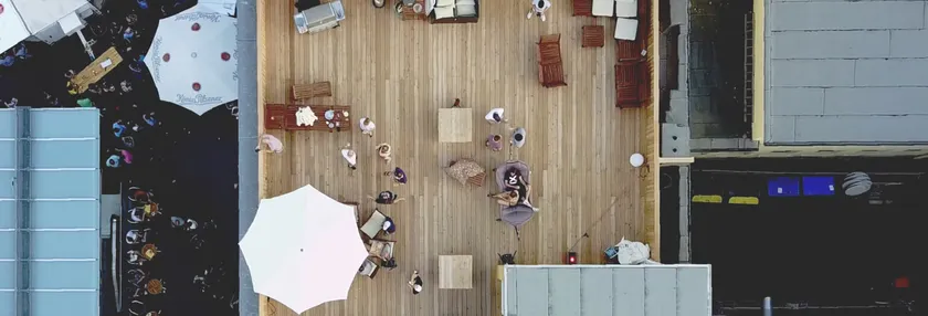 a helicopter view of a big, wooden rooftop in the Bochum Bermuda triangle.